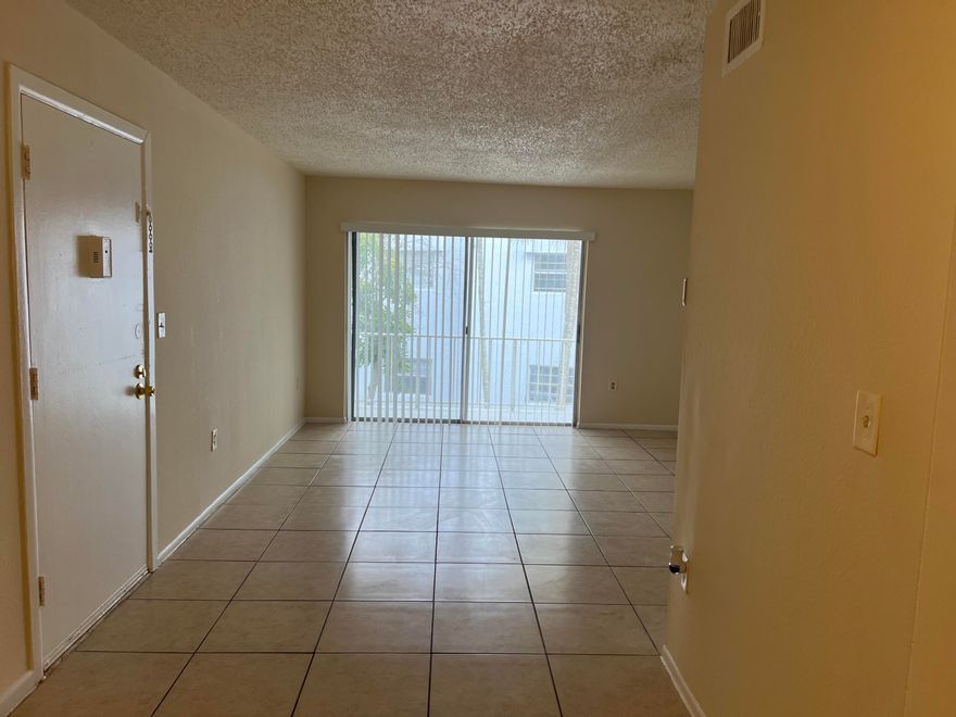 Bright 2 confortables bedrooms, ample closets space, 2nd floor, Tile floors, spacious living area, and great natural light.  Just minutes from downtown, I-95, PBI Airport, and Palm Beach Outlets. Fantastic location, Great Amenities and Laundry facilities.  Just painted. Water included on the rent.