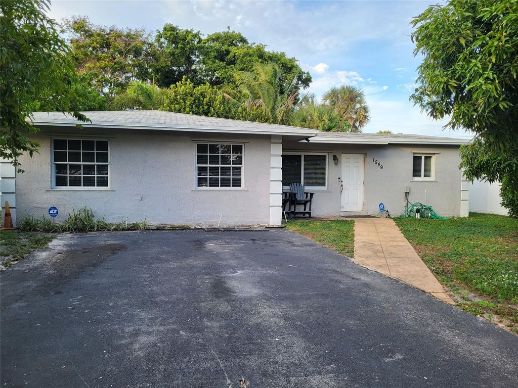 Photo of 1549 NE 26th Court, Pompano Beach, FL 33064 (MLS # F10540267)