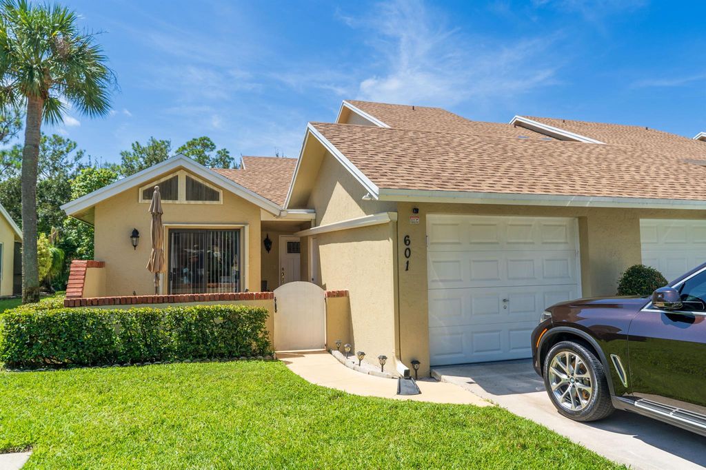 Photo of 601 Maplewood Drive, Greenacres, FL 33415 (MLS # R11123812)