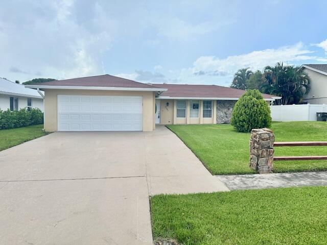 Never before on the market 3 bedroom 2 bath with a 2 car garage in Lake Mango Shores. Updated kitchen, split bedroom floorplan, tile throughout, family room has fireplace. This home has a huge enclosed patio that is great for entertaining.