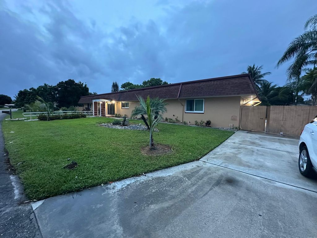 Photo of 1616 Crandon Avenue, Mangonia Park, FL 33407 (MLS # R11132252)