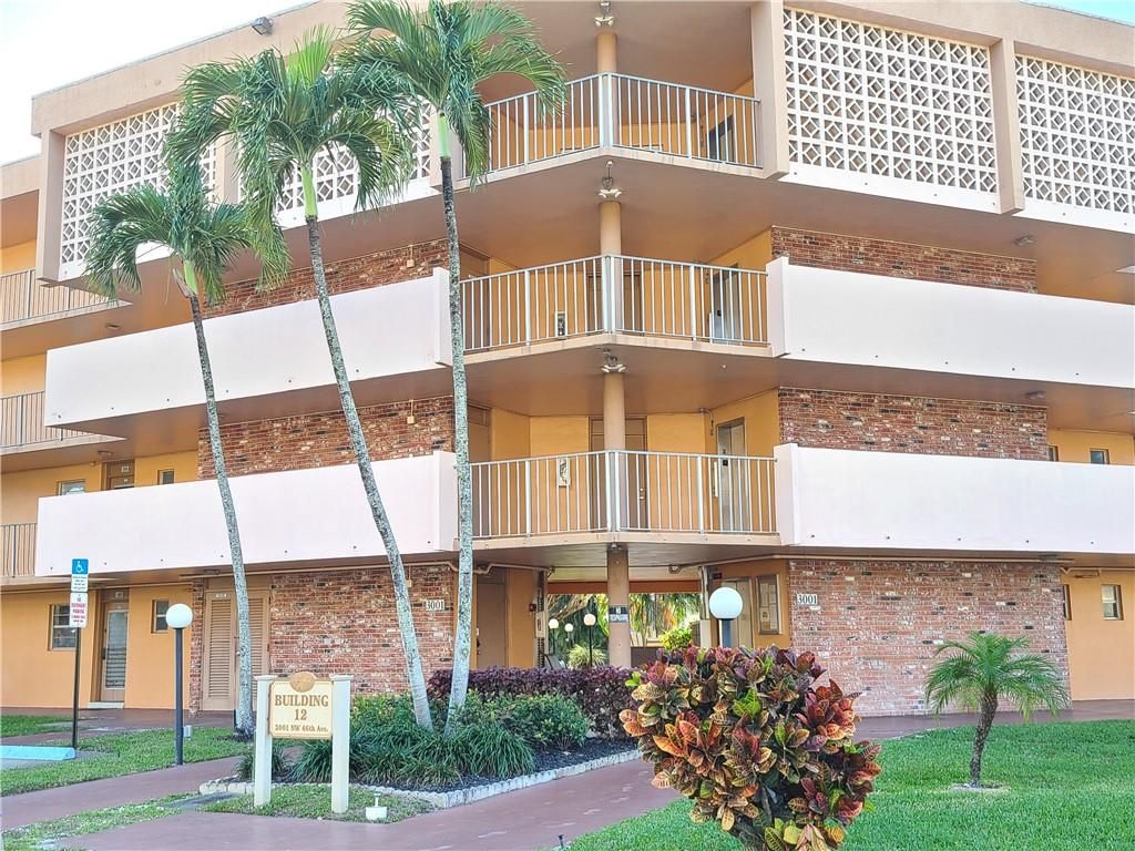 Photo of 3001 NW 46th Ave #101, Lauderdale Lakes, FL 33313 (MLS # F10320462)