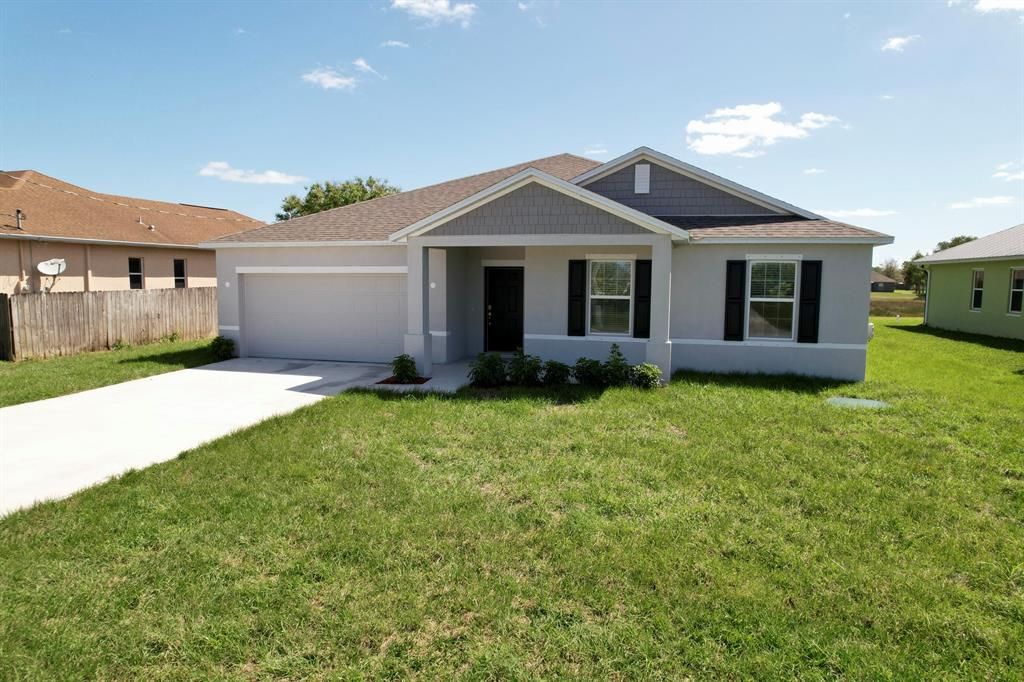 Photo of 5813 NW Coosa Drive, Port Saint Lucie, FL 34986 (MLS # R10779643)