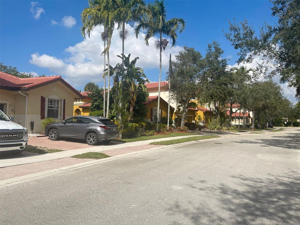 Photo of 5748 NW 119th Terrace, Coral Springs, FL 33076 (MLS # F10538278)