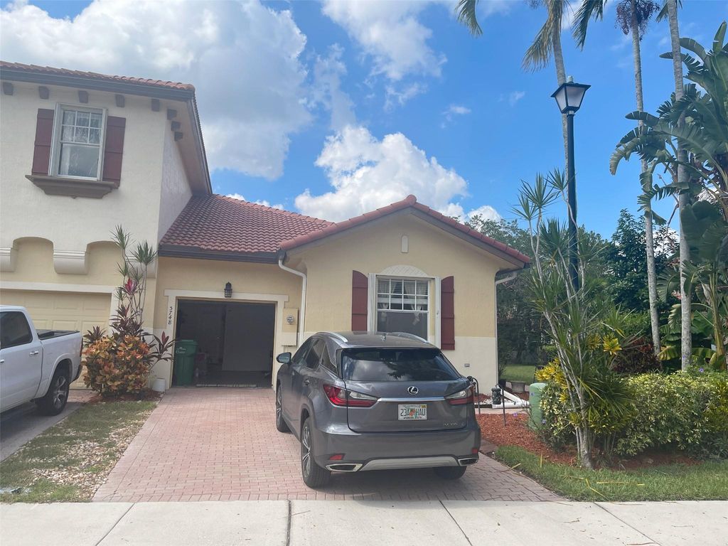 Photo of 5748 NW 119th Terrace, Coral Springs, FL 33076 (MLS # F10538278)