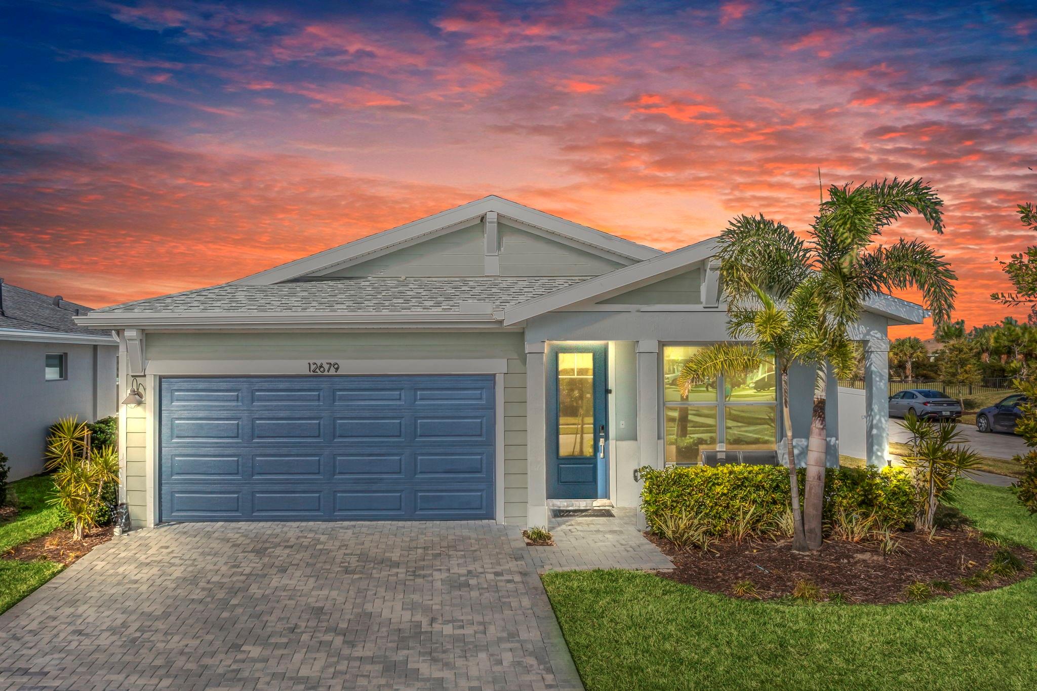 Over 100K in upgrades, screened in patio, & fully fenced-in yard. Welcome to the lowest priced Briar in Tradition. (gated community) Amazing corner lot with a fully fenced-in yard, spacious side yard, &no side neighbors providing ultimate privacy! 3 bed+ a flex space to use as either a den or a 4th bedroom. Impact windows and doors, a barn style sink, crown molding, 42” cabinets, quartz countertops, 2-tone designer island, pendant lighting, upgraded flooring throughout, (No Carpet) frameless glass shower, wall tiles, & the list goes on. Enjoy the community of Tradition with amenities like a resort-style pool, fitness center, event lawn, trail, Paw Park, biking, walking, running, & connecting to the entire community. U.S. News &World rank Port Saint Lucie as one of the best places to live.