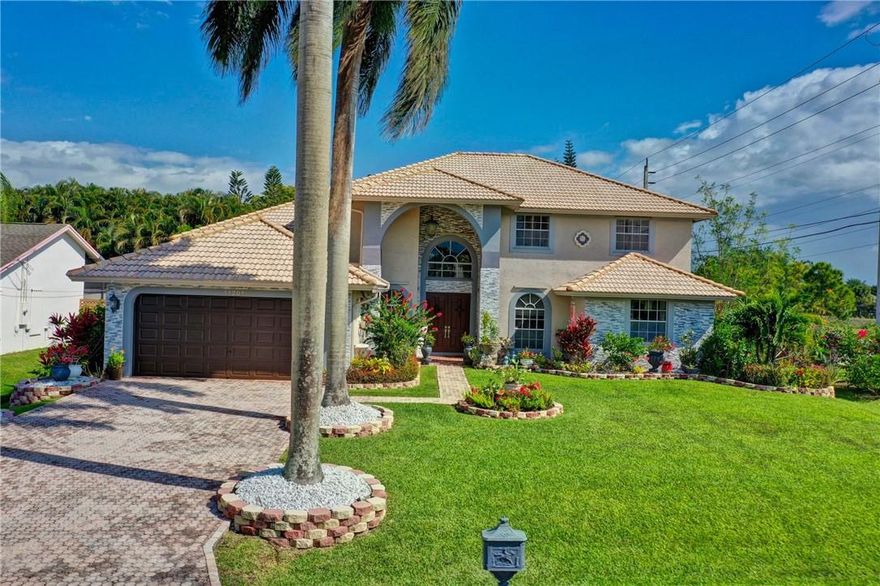 DESIRABLE PLANTATION ACRES!!!!!! Don't miss the opportunity to reside in this beautiful 2 story with over 4,000 sq ft under air masterpiece. This elegant home features 4 bedrooms and 3.5 baths with den. The main level has the primary bedroom along with a guest room and a den. the master bath has a walk around shower, jacuzzi and dressing area. There are 2 large bedrooms upstairs with a loft. Tons of closet space, great open kitchen and family room over looking inviting pool. Large lot with a very private backyard for entertaining. Roof 2006, garage door 2021 and full hurricane protection (panels). Close to Sawgrass Mills Mall, Publix, restaurants and Fort Lauderdale Airport.