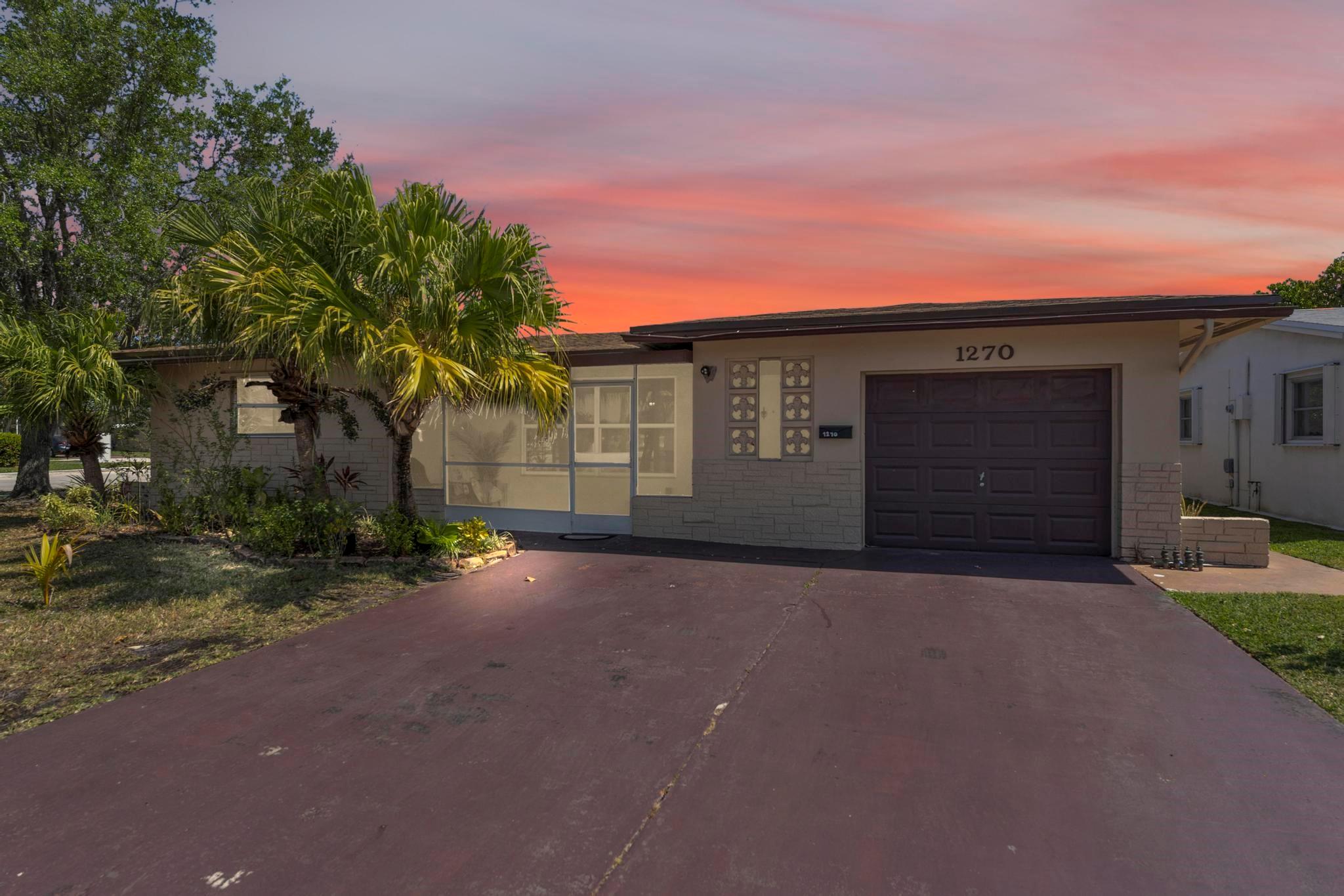 This beautifully renovated 3-bed, 2-bath home in a 55+ community features impact windows, a spacious dining area, open kitchen, and large living spaces. Located on a corner lot, it includes a utility room and one-car garage. Enjoy a private clubhouse, pool, and low HOA fees of $222, covering lawn care and exterior painting. One owner must be 55+, with a 700+ credit score for HOA approval. Close to shopping, Coral Springs Mall, and top schools, offering a great lifestyle and convenience.