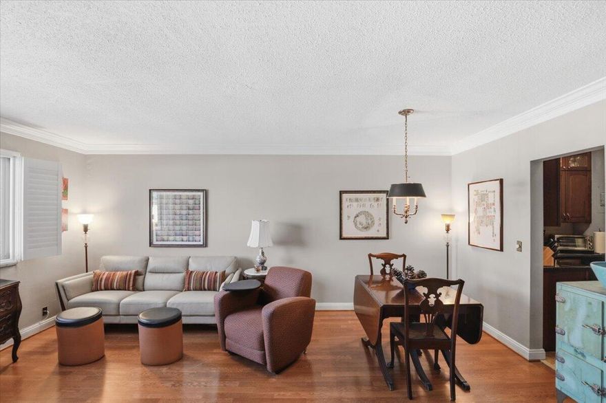 Charming 1 bed 1 1/2 bath 55+ co-op in Georgian Court Apts North. Unit has storm impact windows (2023), engineered oak flooring & marble flooring, black/stainless steel kitchen appliances, Samsung fridge (2024), cherry wood cabinets, granite countertops, crown molding & brand-new water heater (2025). Building has a new water tower, metal roof, & storm impact entry & exit doors. Complex is kept pristine & has lush landscaping. Amenities include a swimming pool, clubhouse with several sitting areas, kitchen, library/reading area, outdoor barbecue grill & terrace sitting areas. Just minutes away to the beach, downtown Fort Lauderdale, Wilton Manors & Oakland Park. Laundry room on premises. Leasing allowed after 2 years. 1 assigned parking & plenty of guest parking. NO PETS Maintenance is $1,659 for the 3rd quarter then goes back to $1,149 for the 4th quarter.