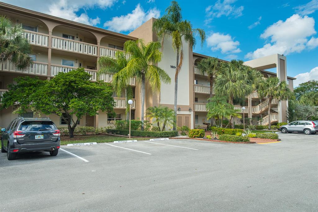 Won't last long!! 1st floor 2Br/2Ba condo in very desirable Wynmoor community.This unit has a RENOVATED white kitchen with NEW WHITE APPLIANCES. It has a large and open floor plan and big bedrooms. The water heater is brand new and A/C just had maintenance done. Parking space is #110 which is an oversized spot. WASHER DRYER INSIDE. Also the building has an extra storage room located next door to this unit.Come take advantage of everything that Wynmoor has to offer (www.wynmoor.com). Golf, tennis, exercise facility, theater, bus system, and much more!
