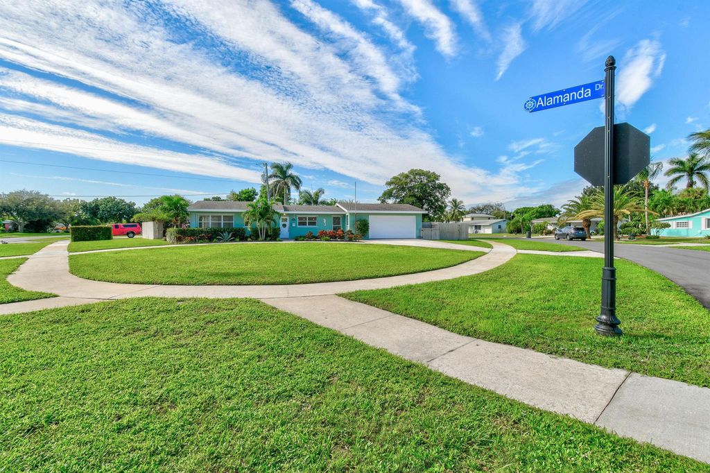 Photo of 740 Alamanda Drive, North Palm Beach, FL 33408 (MLS # R10926203)