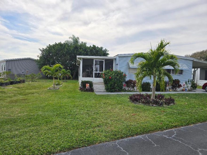 Well kept Mobile home. Newer Floors and lighting fixtures.Beautiful landscaping.  Very nice develoment with community clubhouse, pool, gym, and shuffleball.  Can be a great investment as you can make it a rental. Call listing agent for details.