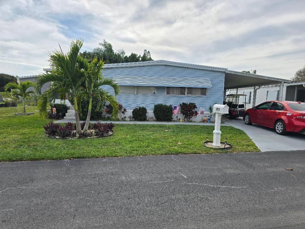 Photo of 277 Kingfisher Ave #277, Fort Pierce, FL 34982 (MLS # R11155713)