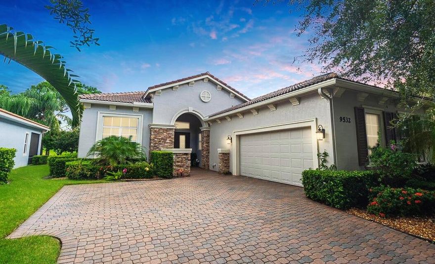 Impressive 3BR/3.5BA/2CG golf-front pool home in PGA Verano 4th green views! Features include a whole-house solar system, EV charger, high-impact windows, luxurious 24'X24' new procelain floors, custom closet cabinetry, beveled glass double-door entry, 2022 A/C. The gourmet kitchen offers granite countertops, 42'' wood cabinets with crown molding, gas cooktop, double wall oven, new stainless appliances, tiled backsplash, breakfast nook, pantry. Spacious layout includes living, dining, and family rooms with decorative fireplace and a large laundry room. Updated baths with touch mirrors, soaking tub. Relax in the covered and screened paver patio with solar-heated pool and spillway spa. HOA includes lawn care, cable, and resort-style amenities clubhouse, efitness center,pools, picklebalL