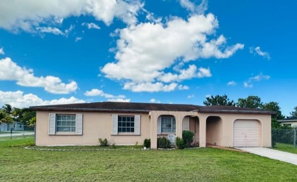 Photo of 10915 Stacey Ln, Boca Raton, FL 33428 (MLS # F10384210)