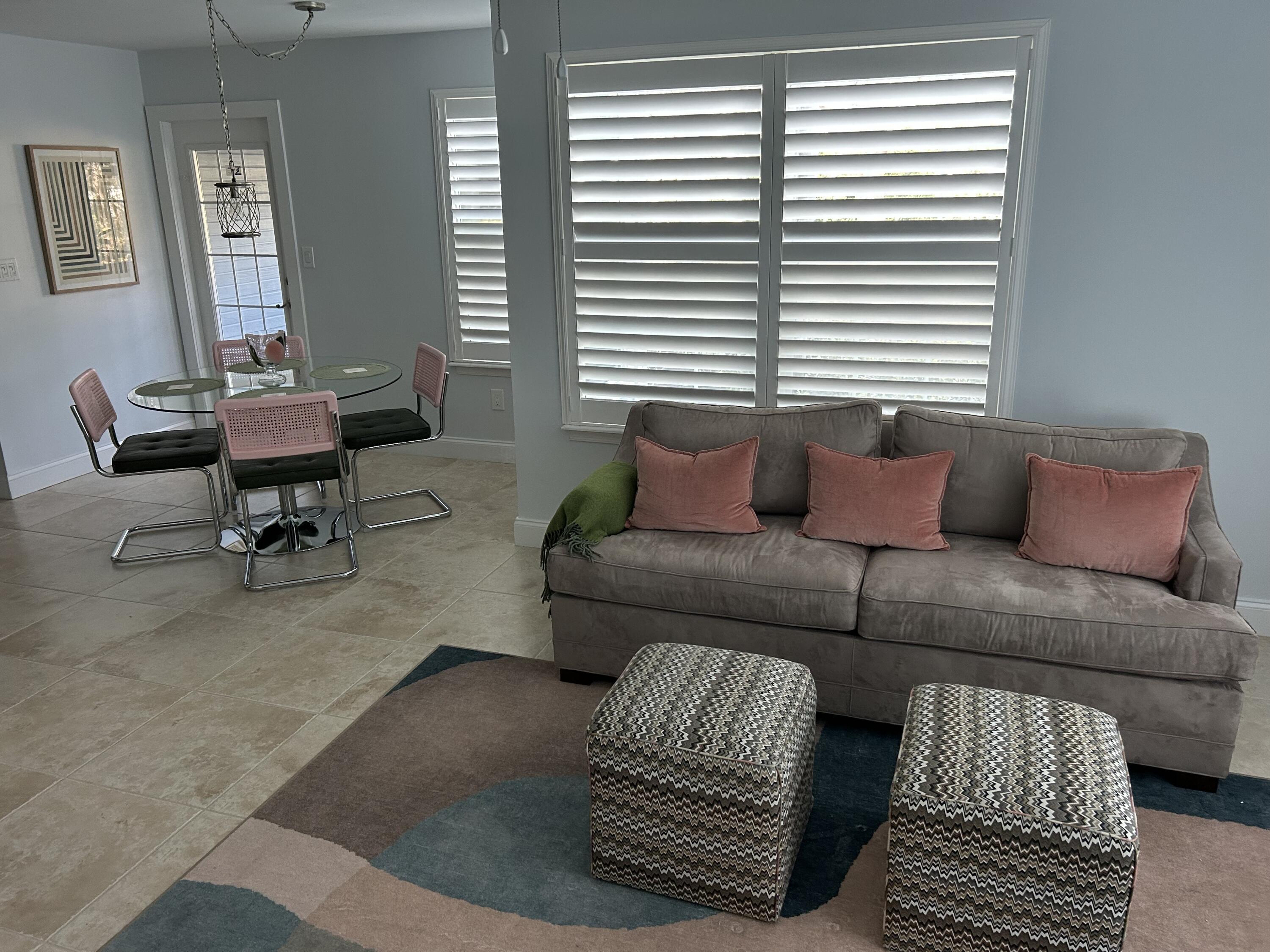 SEASONAL RENTAL-Live a Key West-like resort lifestyle in this first floor lakefront furnished 2 BR/2BA condo 1 MILE FROM THE BEACH AND 2 TO DOWNTOWN DELRAY-Serene tranquil lake views from every room-Spacious and airy open Kitchen/living area-Enjoy morning coffee or a lazy afternoon nap on your private screened in porch-Impact windows, new appliances and furniture, plantation shutters and tasteful interior decor are all part of the recent renovation-Just bring your clothes & books! Washer & Dryer in unit-Basic cable included-Pool, gym, hot tub, and clubhouse included-Conveniently located to all major highways & shops- Walk to Target, First Watch, Whole Foods & more! 1 dog allowed under 40 lbs. -No cats-OWNER WILL CONSIDER ANNUAL RENTAL TO END 5/31/26 AT $2700 MONTHLY.