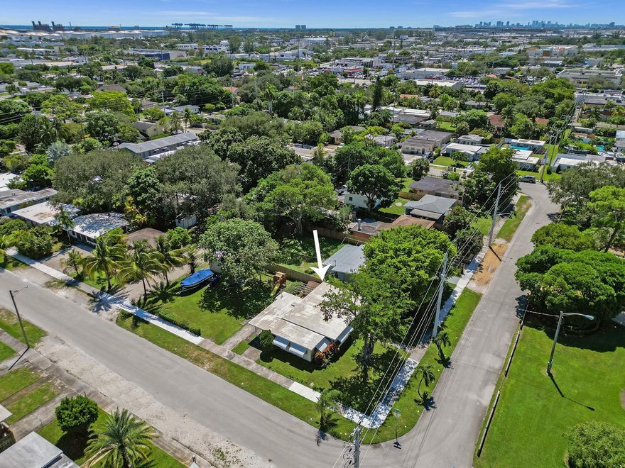 Fantastic opportunity in sought after Croissant Park situated on an oversized 8,200 sf corner lot (130' x 63'). This home is steps from Bryant Peney Park which offers picnic tables, playground and mature trees. The inside features 3 bedrooms, terrazzo flooring throughout, laundry room with storage and more. Great opportunities as an investment or a great starter home ready for your custom touches. Roof 2015! Croissant Park is in a great location that is close to literally everything. Less than 3 miles to the Ocean, 2 miles to Las Olas Night Life Dining & Shopping. Quick access to 95 / 595 for commutes & under 10 min to FLL Airport. NO HOA.