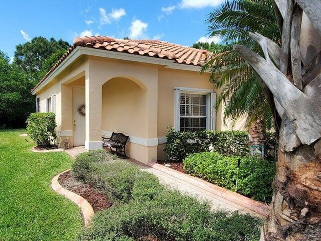 Photo of 430 NW Lismore Lane, Port Saint Lucie, FL 34986 (MLS # B26004666)