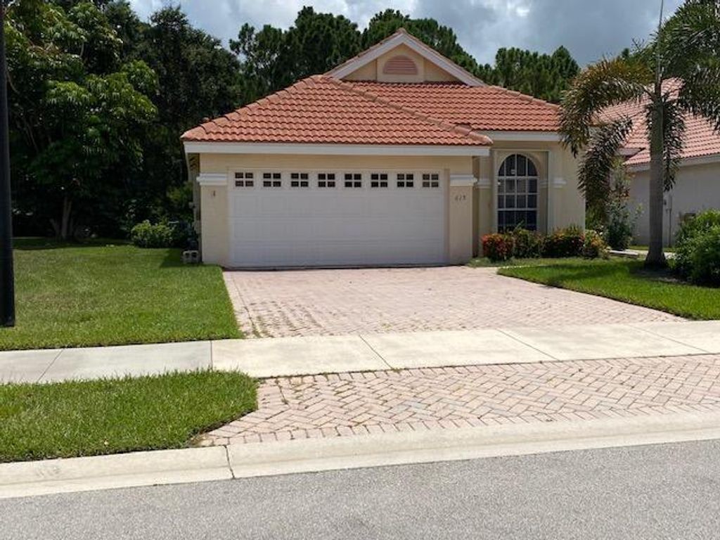Photo of 615 SW Saint Thomas Cove, Port St Lucie, FL 34986 (MLS # R10882511)