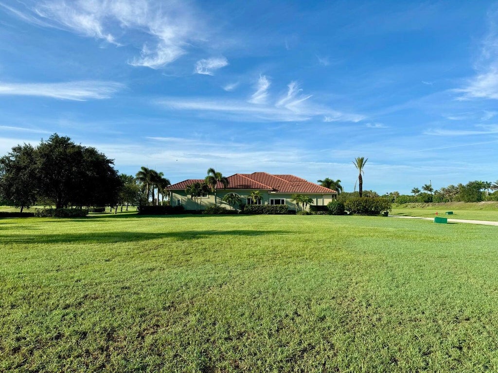 Photo of 104 SE RIO SIENA, Port Saint Lucie, FL 34984 (MLS # B26075797)