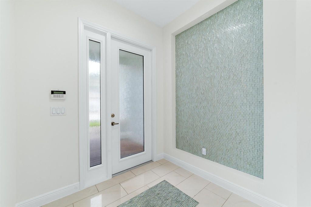 Photo of 3040 Princeton Lane, Palm Beach Gardens, FL 33418 (MLS # R11094316)