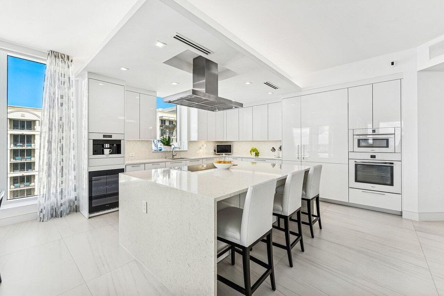 Welcome to the epitome of luxury living at Vistablue, Residence 17C, professionally designed by Decorators Unlimited. This private floor-entry residence offers 3,029 square feet of refined coastal elegance with 3 bedrooms, 3.5 baths, a den, and an oversized wraparound terrace ideal for entertaining while enjoying sweeping Intracoastal and partial ocean views. The light-filled gourmet kitchen features sleek Poggenpohl custom cabinetry, dramatic quartz waterfall countertops, and top-of-the-line Miele and Sub-Zero appliances. Soaring floor-to-ceiling impact glass and sliding doors enhance the open, airy design and seamlessly connect indoor and outdoor living. The serene primary suite offers generous walk-in closets and a spa-inspired bath. Stunning Italian porcelain flooring throughout. Step outside to experience resort-style beachfront living with 5-star amenities, including concierge service, ocean view social lounge, private wine vault, state-of-the-art fitness center with sauna, and an elevated pool deck with cabanas and direct beach access.
*Unit has 2 deeded parking spaces and large storage locker. 
This is luxury coastal living at its finest residence that seamlessly blends sophisticated design, top-tier finishes, and world-class amenities. Close to PBI Airport, 5 star restaurants, The Breakers, City Place, Gardens Mall.