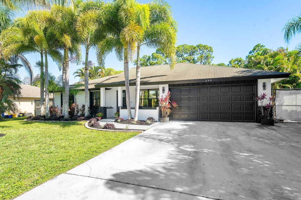 Photo of 299 Sandpiper Avenue, Royal Palm Beach, FL 33411 (MLS # B26025403)