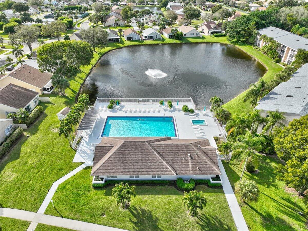 This meticulously kept 1st-floor condo offers a tranquil retreat with stunning lake views, all within a prime location in Central Delray. Enjoy the convenience of quick access to both I-95 and the Florida Turnpike, with shopping, dining, and entertainment just minutes away. Inside, you'll find a spacious layout featuring laminate wood flooring in the kitchen, an updated primary bath, and a newer hot water heater and A/C system. For your peace of mind the A/C comes with a 10-year parts and labor warranty. Whether you're relaxing by the lake or enjoying the comfort of your 2 bed / 2 bath home, this condo truly combines the best of both worlds--convenience and comfort.
