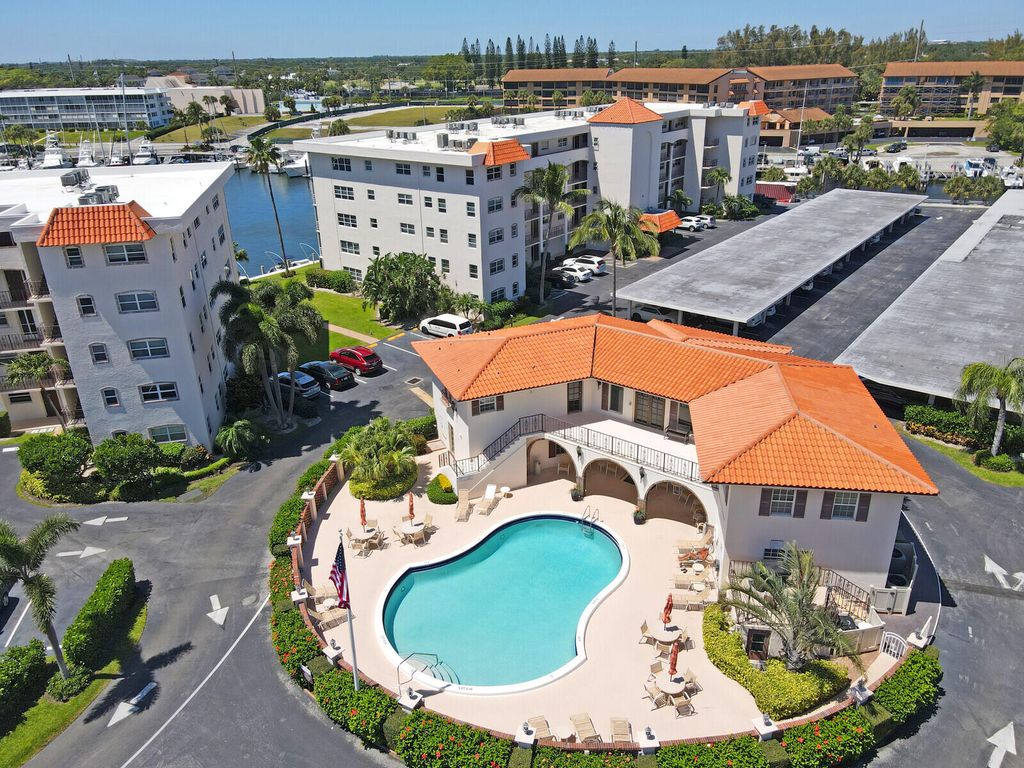 Photo of 28 Yacht Club Drive #103, North Palm Beach, FL 33408 (MLS # R10976110)