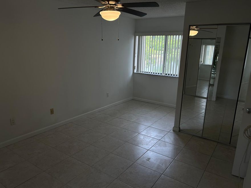 Modern Living at Its Best! This stunning 2-bedroom, 2-bath ground-floor apartment has been completely renovated and is ready for you to move in. Enjoy a stylish upgraded kitchen with quartz countertops, sleek tile flooring, and beautifully remodeled bathrooms. Plus, the convenience of your own washer and dryer right inside the unit! Perfectly located just minutes from major highways and Hard Rock Stadium, this home offers comfort, style, and unbeatable accessibility. Quick approval—move in fast! (Only Two Months)