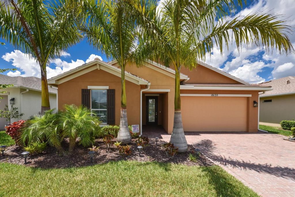 Photo of 10135 SW Coral Tree Circle, Port St Lucie, FL 34987 (MLS # R10901040)