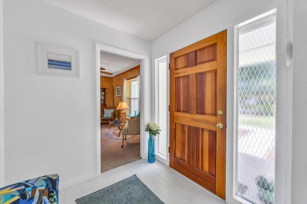 Photo of 313 Country Club Drive, Tequesta, FL 33469 (MLS # R11098807)