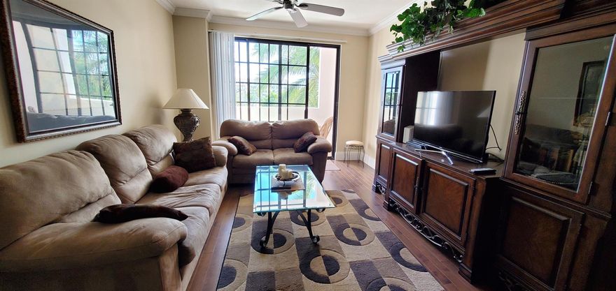 THE LUXURIOUS BOCA GRAND CONDO IS LOCATED IN DOWNTOWN BOCA RATON. THIS LIGHT & BRIGHT FURNISHED CONDO IS VERY SPACIOUS WITH AN OPEN FLOOR PLAN AND SPLIT BEDROOMS. BEAUTIFUL WOOD FLOORING THROUGHOUT AND THE KITCHEN HAS ITALIAN WOOD CABINETRY, GRANITE COUNTER TOPS, & STAINLESS STEEL APPLIANCES. STEP OUT TO THE BALCONY AND ENJOY THE NICE CITY VIEWS. ENJOY 5 STAR AMENITIES AT THE RESORT INSPIRED POOL, JACUZZI, STATE OF THE ART FITNESS CENTER, CLUB ROOM WITH BUILT IN BAR, TV, BILLIARDS & LIBRARY. BUSINESS CENTER WITH PRIVATE CONFERENCE ROOM, NEW COMPUTERS & DESKS, AND COMPLIMENTARY VALET IS INCLUDED. JUST MINUTES TO THE BEACH!