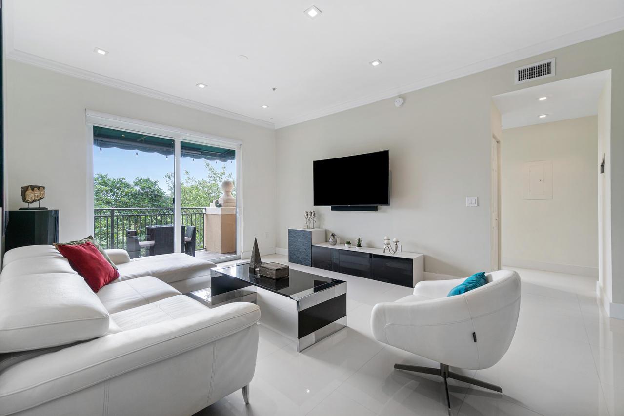 This exquisite, newly renovated condo is situated in the gated community of Saint Andrews at the Polo Club, right in the heart of Wellington. Not a single expense was spared in this residence spanning just under 1500 square feet. Classic finishes, high ceilings, a split bedroom floor plan, a 1-car garage and both lake & golf course views distinguish this unit from any other. The master suite features a large walk-in closet and a master bathroom complete with dual sinks and a glass-enclosed shower/tub combo. The second of three bedrooms doubles as a second master bedroom. The kitchen features granite countertops & stainless steel Appliances. This residence is the perfect definition of turn-key, featuring impact glass throughout. *Third bedroom will have a bed and trundle*