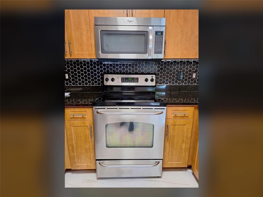 Photo of 6492 Emerald Dunes Drive #108, West Palm Beach, FL 33411 (MLS # R11127159)