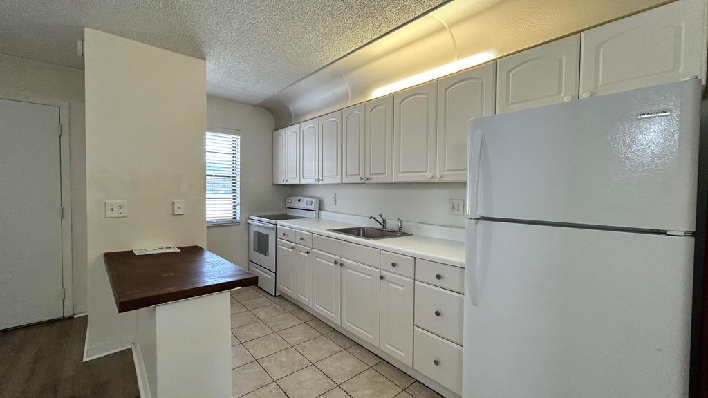 Photo of 1041 SE Monterey Road, Stuart, FL 34994 (MLS # B26015947)