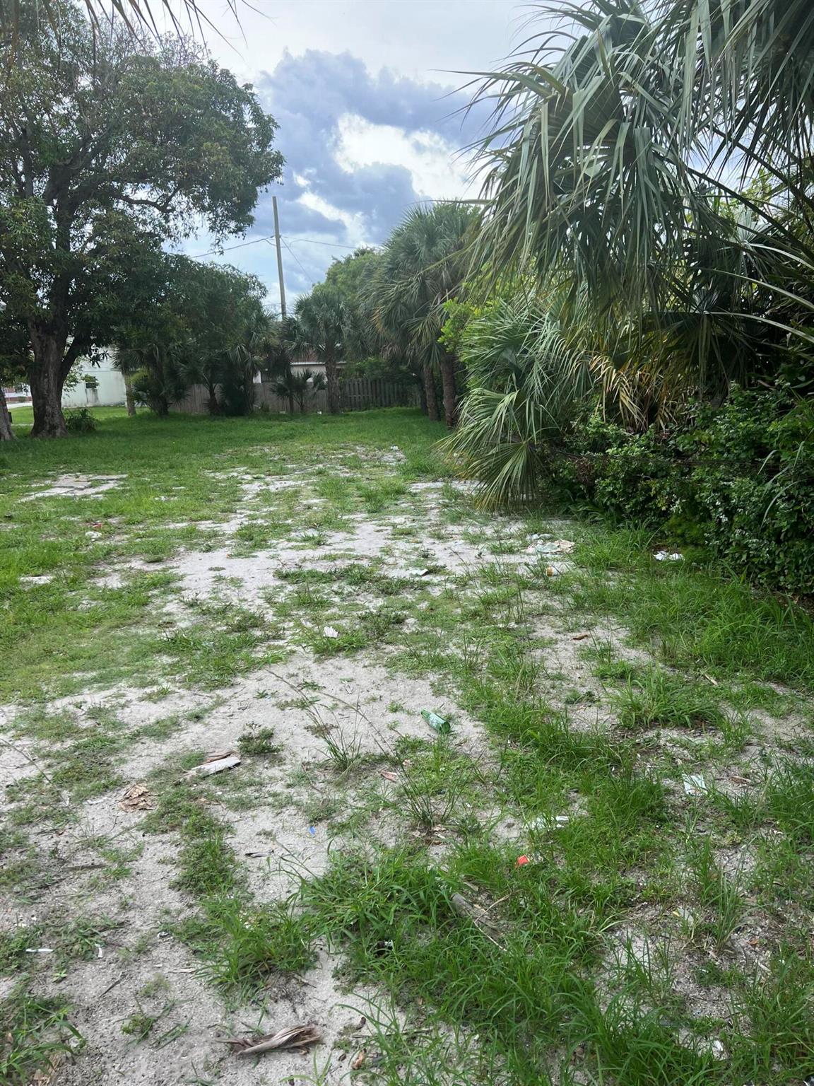 New developments all over neighborhood. Lot is surrounded by single family homes, multi-family homes and businesses. Close to Downtown West Palm Beach, The Square. Under 2 miles to 95.