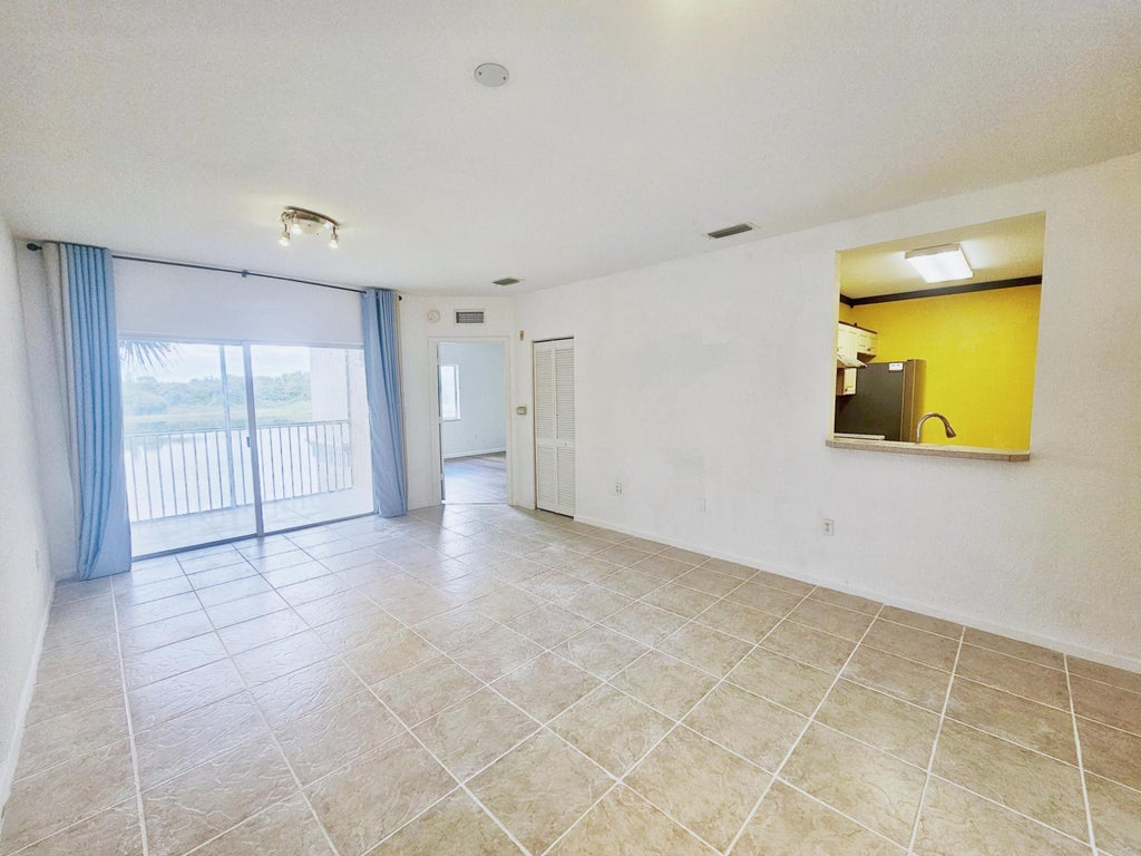 Photo of 1157 GOLDEN LAKES BLVD #621, West Palm Beach, FL 33411 (MLS # B26073858)