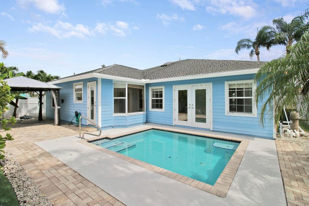 Photo of 6118 Barbara Street, Jupiter, FL 33458 (MLS # R10994299)