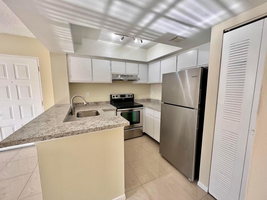 Photo of 752 Executive Center Drive #33, West Palm Beach, FL 33401 (MLS # B26001365)