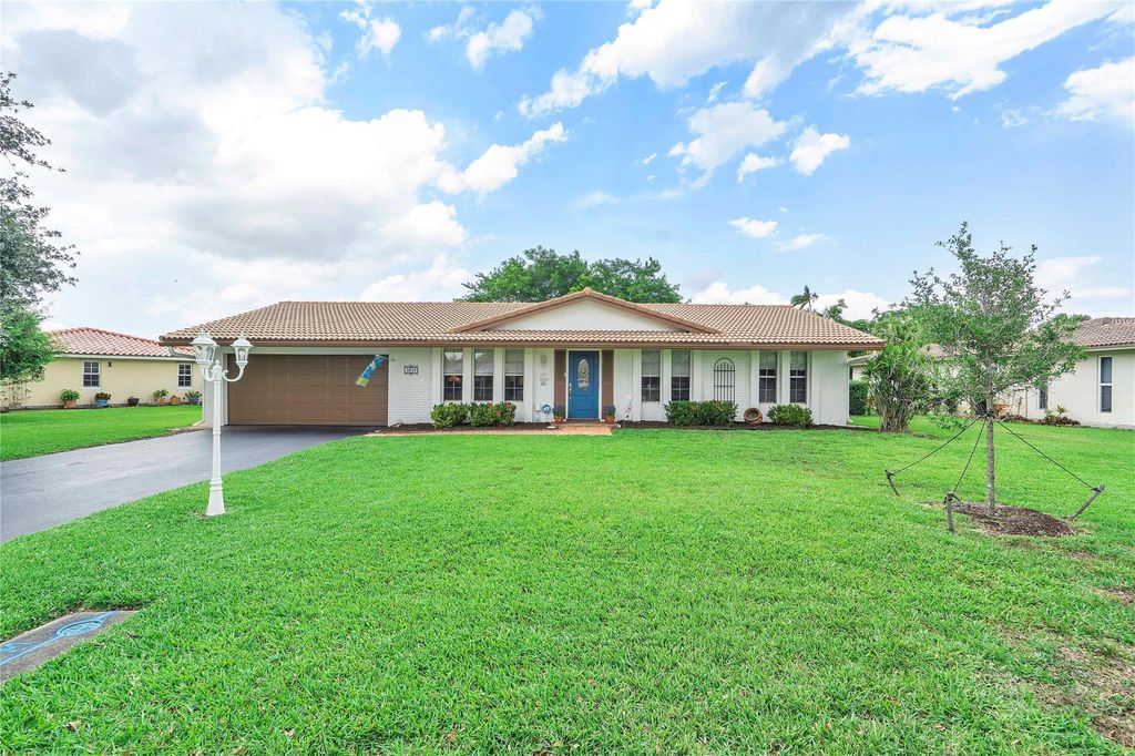 Photo of 3915 NW 106th Drive, Coral Springs, FL 33065 (MLS # F10501709)