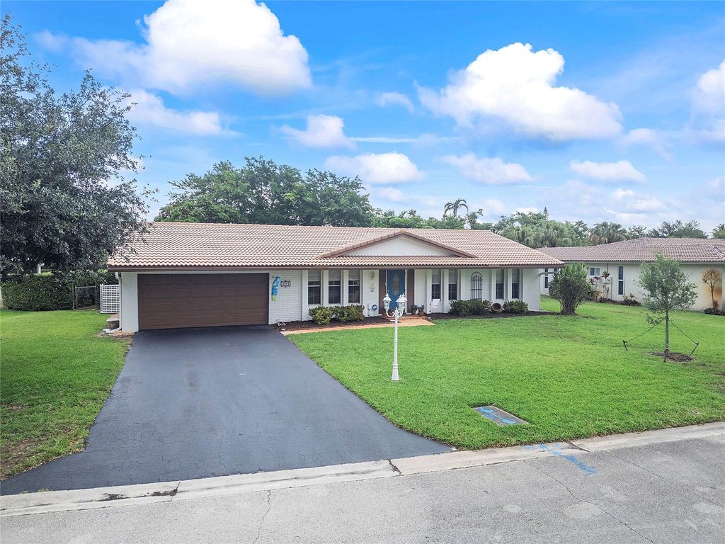 Photo of 3915 NW 106th Drive, Coral Springs, FL 33065 (MLS # F10501709)