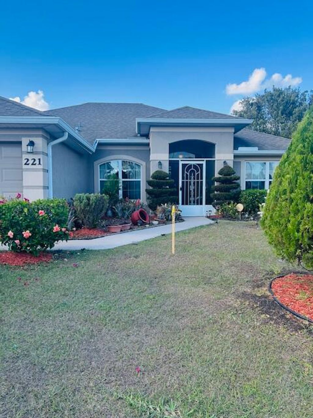Photo of 221 SW Kestor Drive, Port Saint Lucie, FL 34953 (MLS # R11157781)