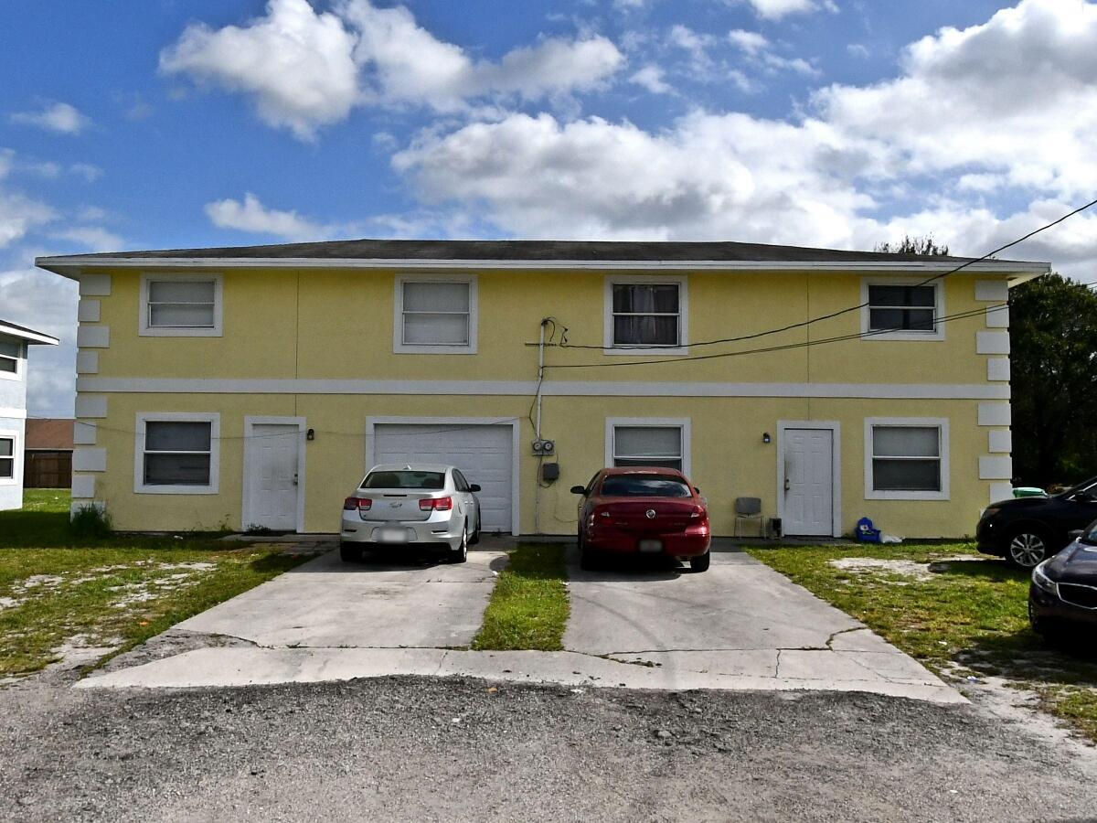 Currently one side vacant while under renovation. Perfect opportunity to live in one side and rent out the other. New well pump & septic system replaced in 2024. Great location for this 8 bedroom & 4 bathroom property, situated on a 1/4 acre lot. Close to all of downtown Fort Pierce and down the road from the airport. Roof is 2019.