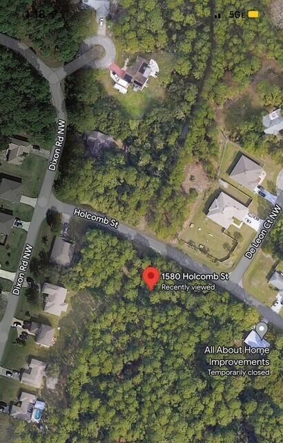 Discover this spacious 11,761 sqft corner lot tucked away in a peaceful neighborhood, offering privacy and minimal traffic. Surrounded by mature trees, this property is perfect for those seeking a tranquil setting to build their dream home or investment opportunity.Nature lovers will appreciate the close proximity to local parks and outdoor amenities, providing plenty of options for sports, picnics, and pet-friendly activities.Conveniently located, you can easily access St. Johns Heritage Parkway for your daily commute or head down the bustling Malabar Road corridor to enjoy a variety of popular stores, restaurants, banks, healthcare facilities, and quick access to I-95.Don't miss out on this rare opportunity to own a sizable, beautifully wooded lot in Palm Bay. Schedule your