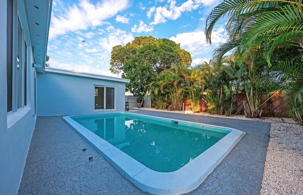 Photo of 5710 NE 2nd Ter, Fort Lauderdale, FL 33334 (MLS # F10543340)