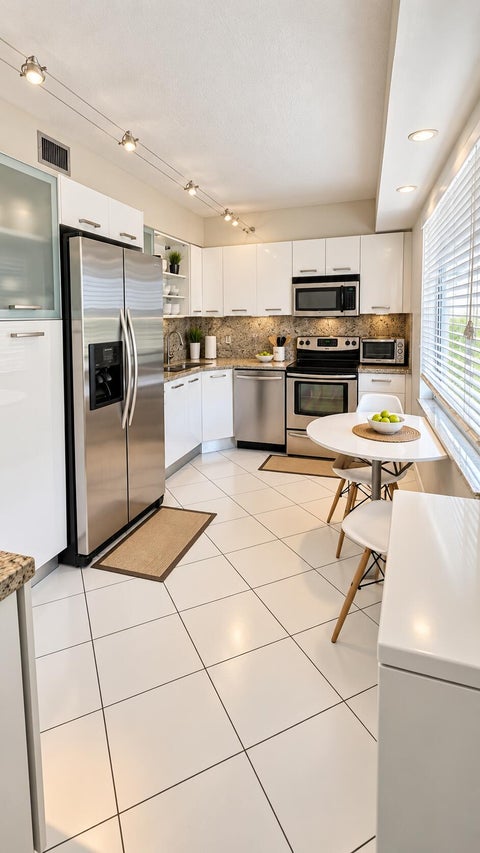 Tiny photo for 3510 OAKS Way #408, Pompano Beach, FL 33069 (MLS # B26079786)
