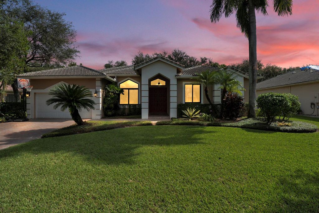 Photo of 5718 NW 50 Drive, Coral Springs, FL 33067 (MLS # R11081160)