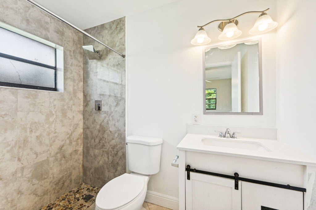 Photo of 270 NW 3rd Avenue, Deerfield Beach, FL 33441 (MLS # R10954042)