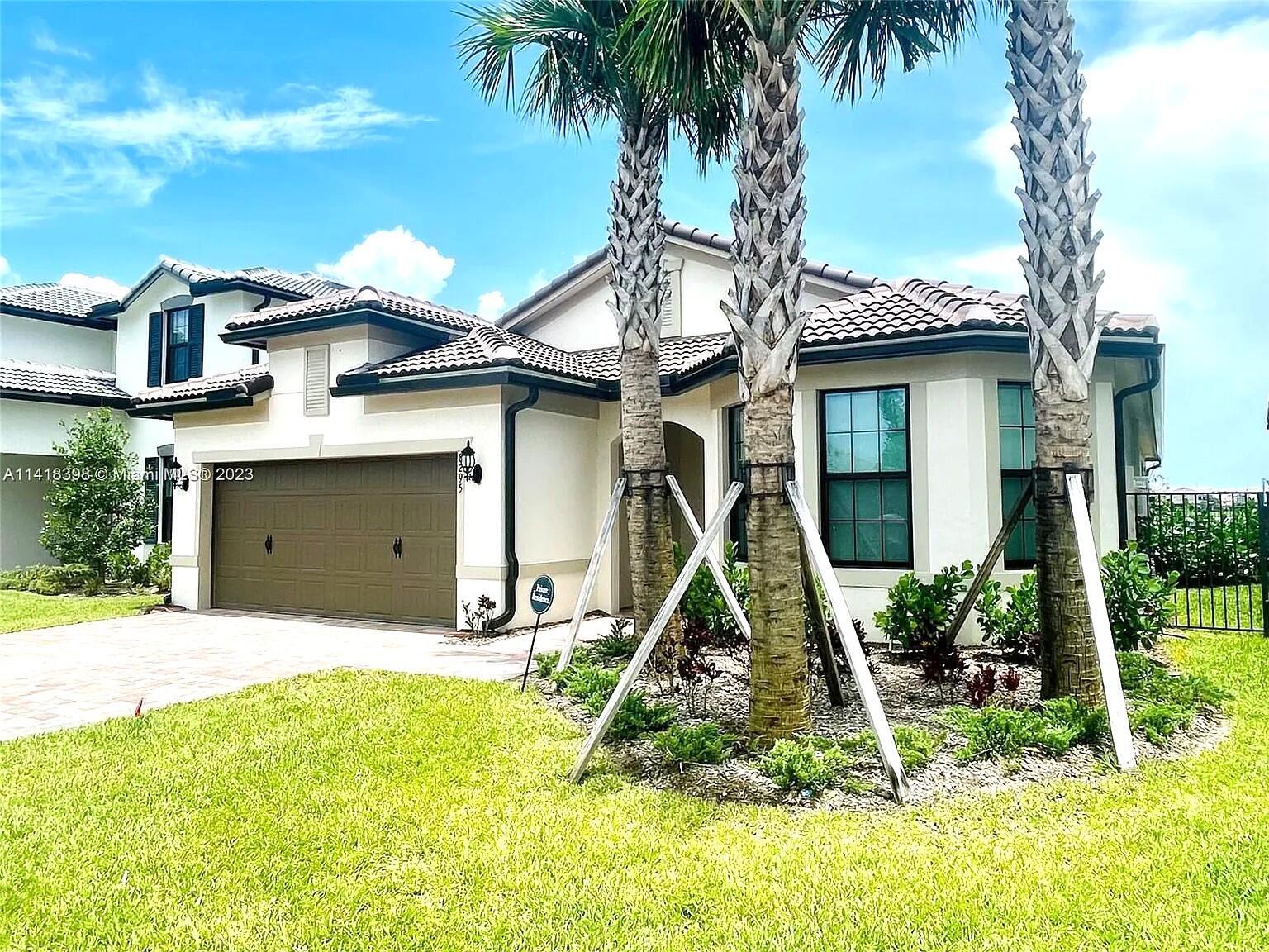 Gorgeous lakefront house built in 2022: 4 bedrooms, 2 bathrooms, large living room and dining area. Fully fenced backyard - perfect for dogs. Wood-like tile and LVP flooring throughout the house (no carpet anywhere!). Impact windows & doors. 2-car garage. Blackout shades in bedrooms. Energy efficient LED lighting throughout the house. Fans in each bedroom and living room. Huge, screened patio with a zero-corner, pocket sliding glass door allows you to enjoy the best lake and fountain view in the community. Laundry room with a sink. Gated community with a spectacular resort-style community pool, fitness center, tennis courts, pickleball courts, and a clubhouse accessible to residents via key fob. Fast HOA approval. Must see it to appreciate it!